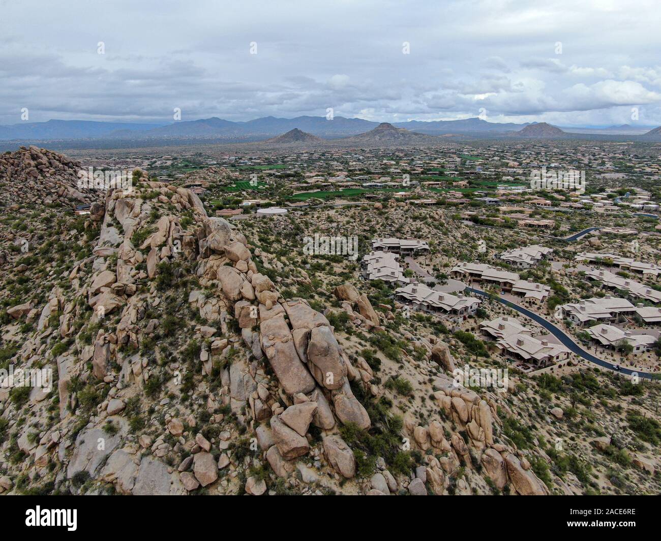 Photo inspiration: Picture Idea: Aerial View Of Upscale Luxury Homes With Dry Landscape Mountain