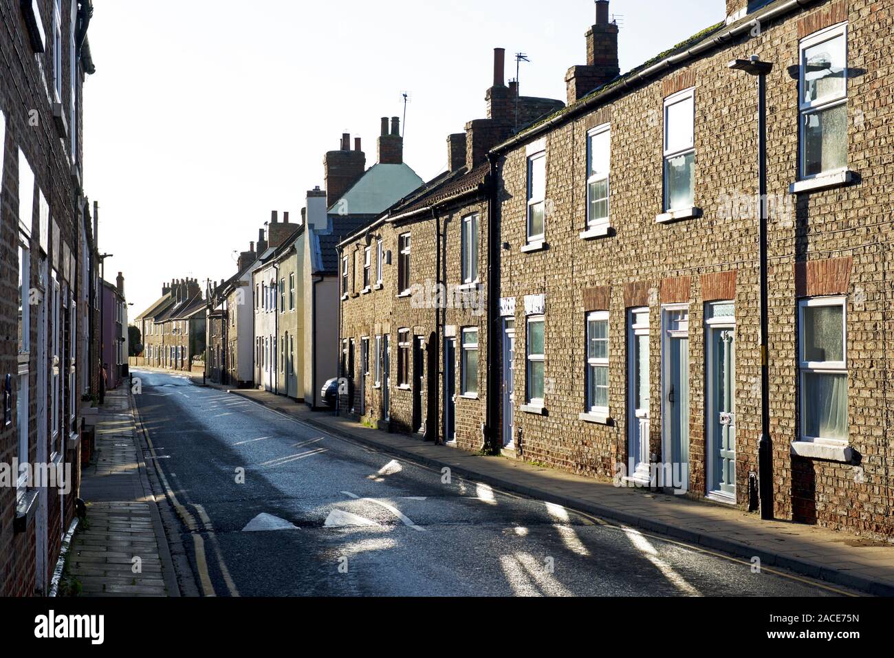 Street of terraced houses in the village of Cawood, North Yorkshire, England UK Stock Photo