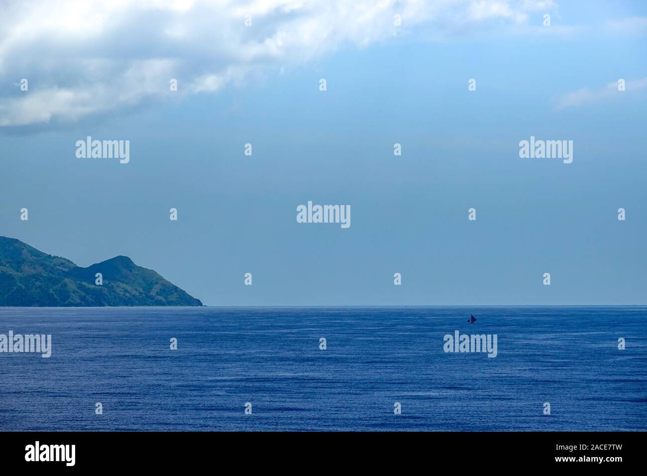 haiti-11/1/19: The hazy and mountainous coastline of the Caribbean Island of Haiti as a cruise ship sails by. Stock Photo