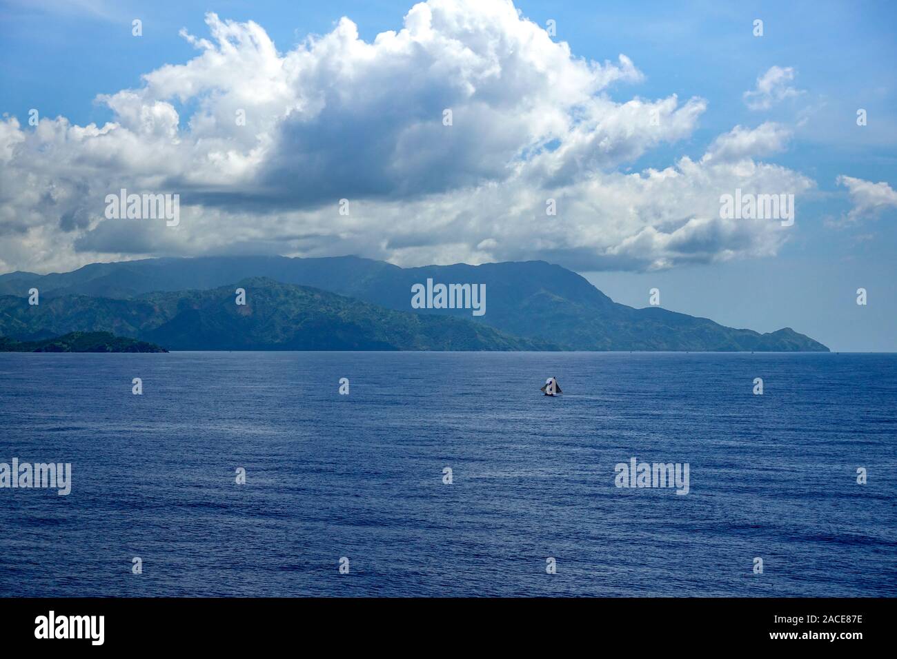 haiti-11/1/19: The hazy and mountainous coastline of the Caribbean Island of Haiti as a cruise ship sails by. Stock Photo