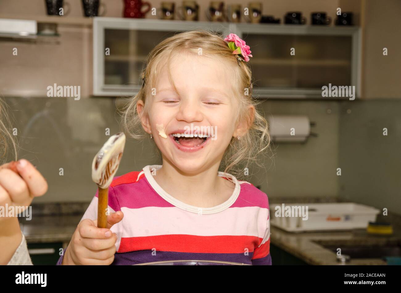 Child having fun in kitchen hi-res stock photography and images - Alamy