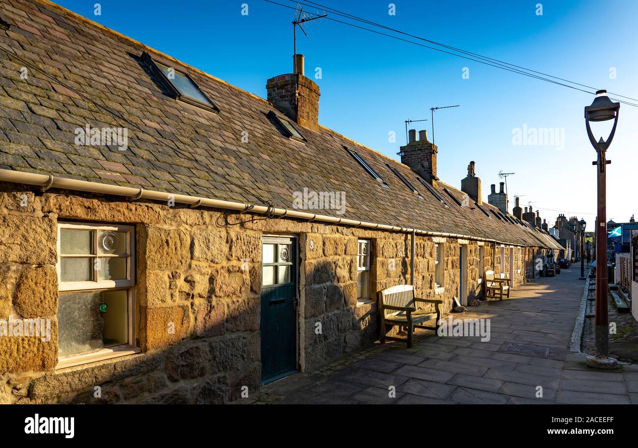 Row of historic cottages at Footdee in Aberdeen, Scotland, UK Stock Photo