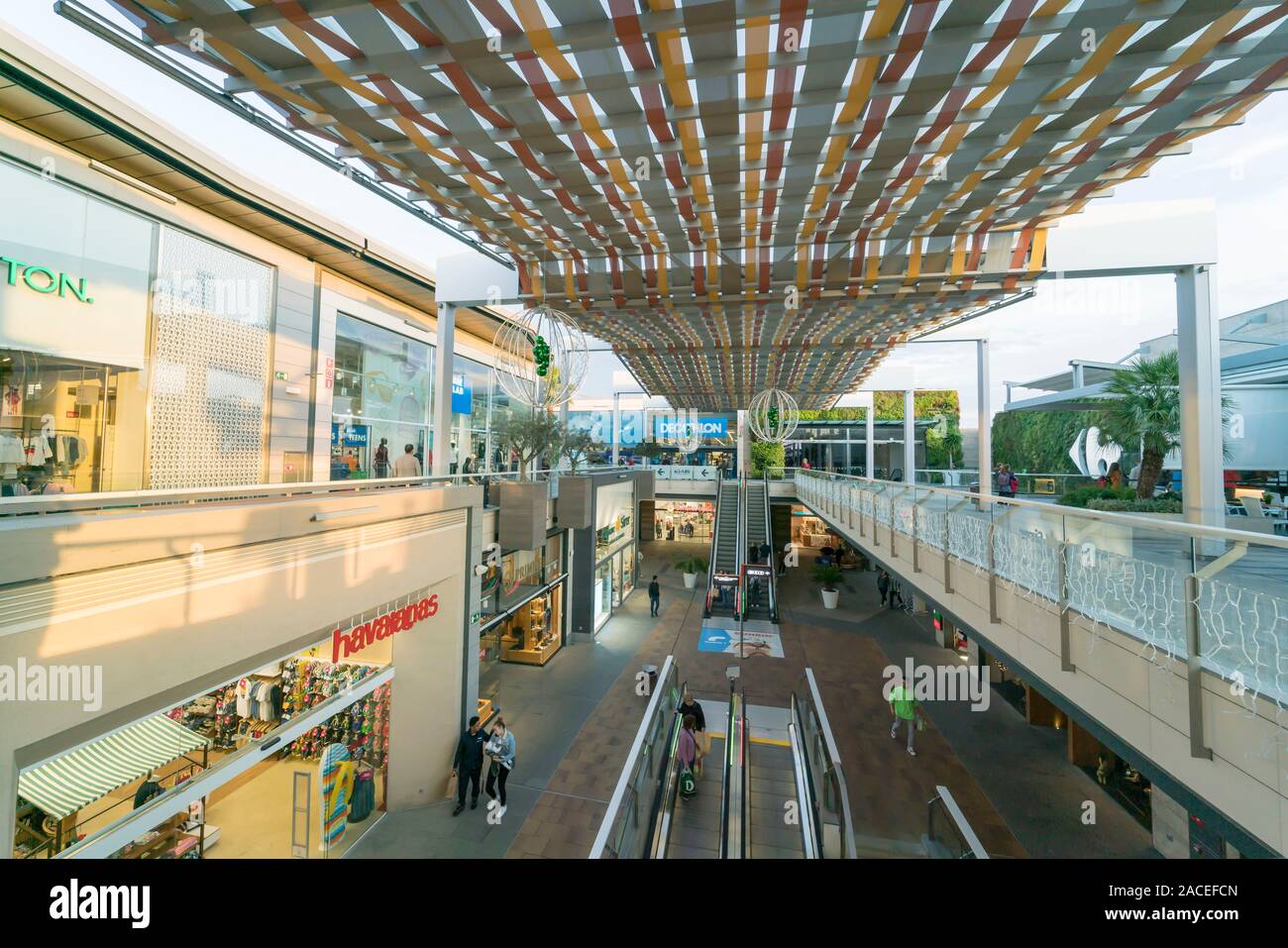 Palma de Mallorca, Spain - December 2, 2019: View of the fashion shopping mall during the Christmas campaign. Several outfit Stock Photo - Alamy
