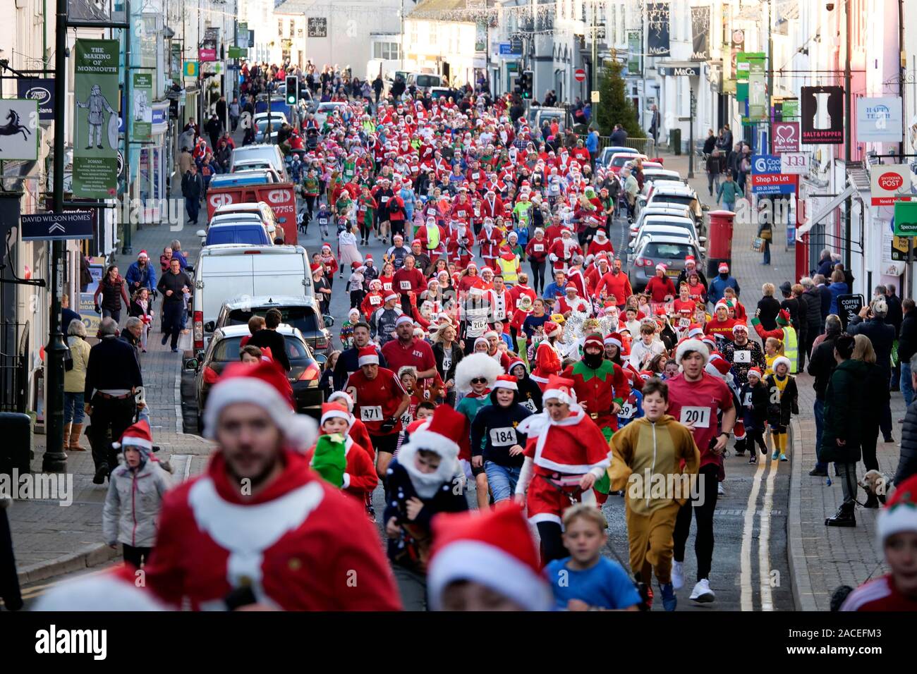 Around 500 people took part in the Monmouth Santa Fun Run, starting and finishing at the landmark, historic Monnow Bridge on Sunday 1st December. The Stock Photo