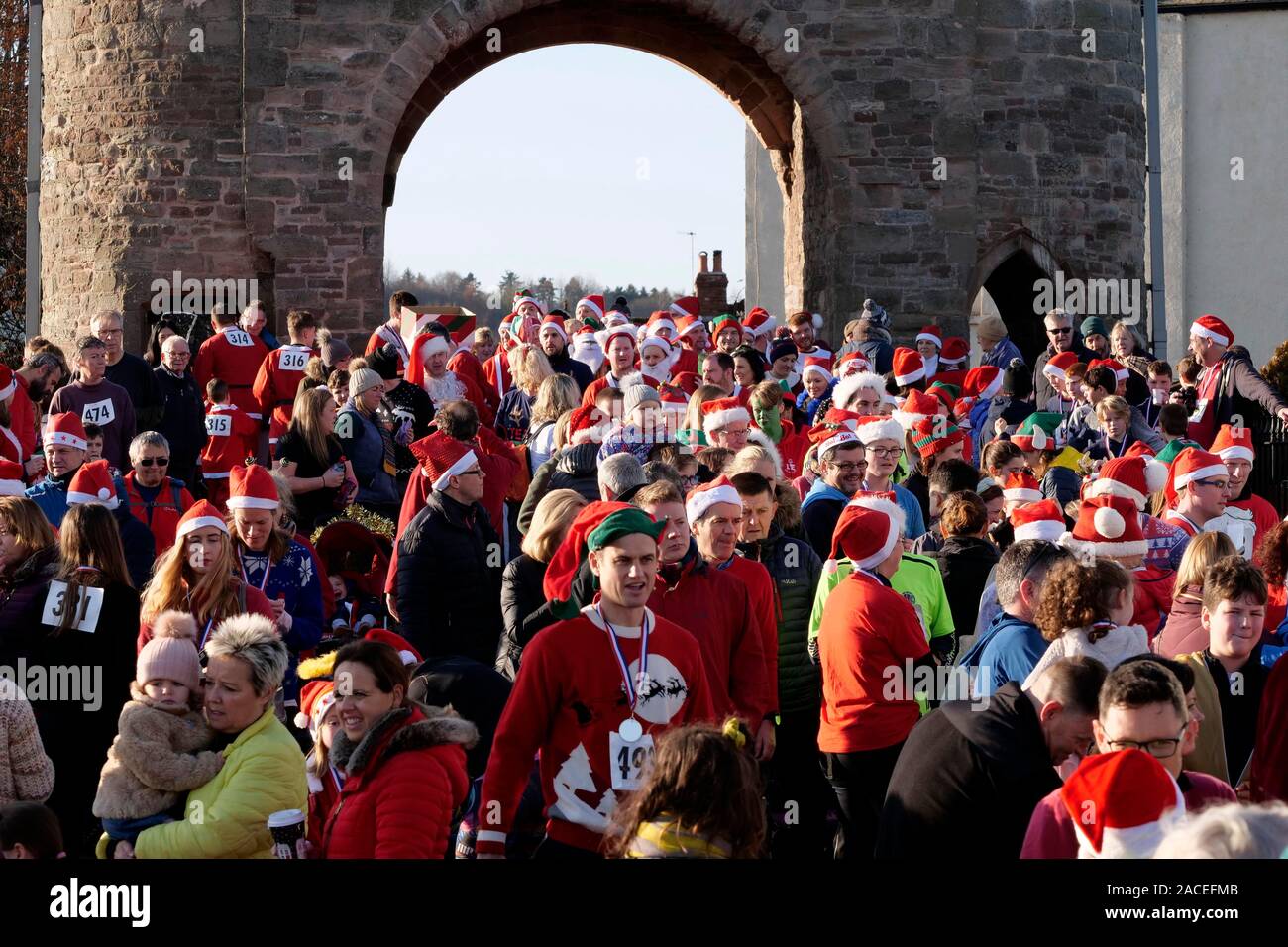 Around 500 people took part in the Monmouth Santa Fun Run, starting and finishing at the landmark, historic Monnow Bridge on Sunday 1st December. The Stock Photo
