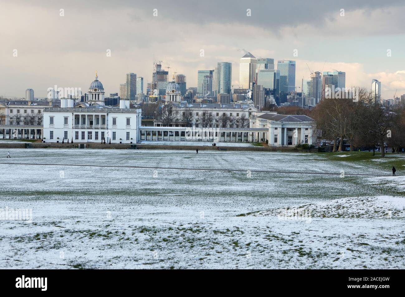 The Old Royal Navy College, and The City in the snow Stock Photo