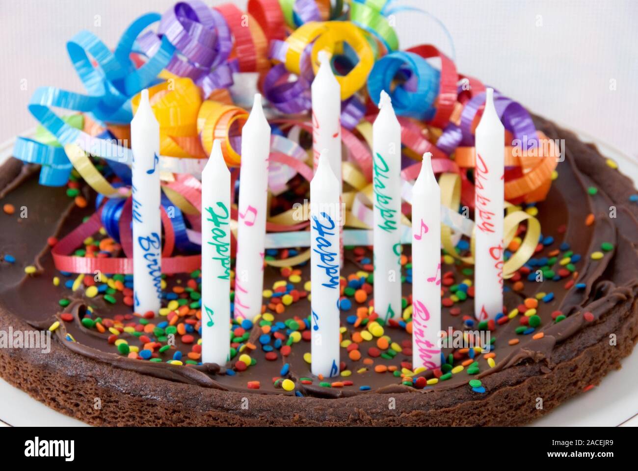 White chocolate frosted happy birthday cake candles hires stock photography and images Alamy