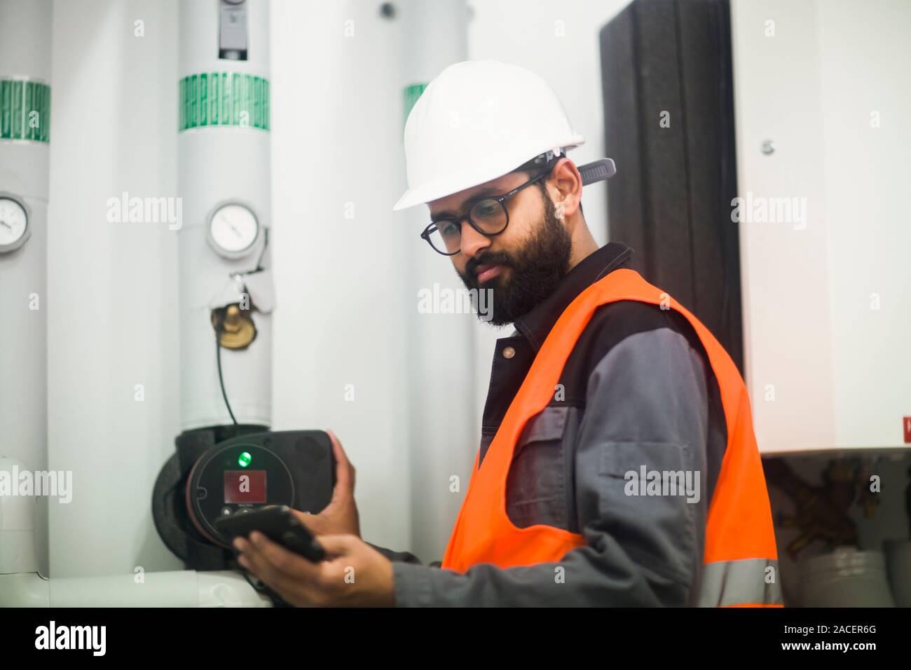 heating engineer checking system Stock Photo Alamy