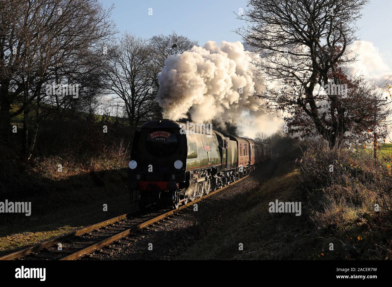 34092 City of Wells heads past Springside Farm on the East Lancs Railway. Stock Photo
