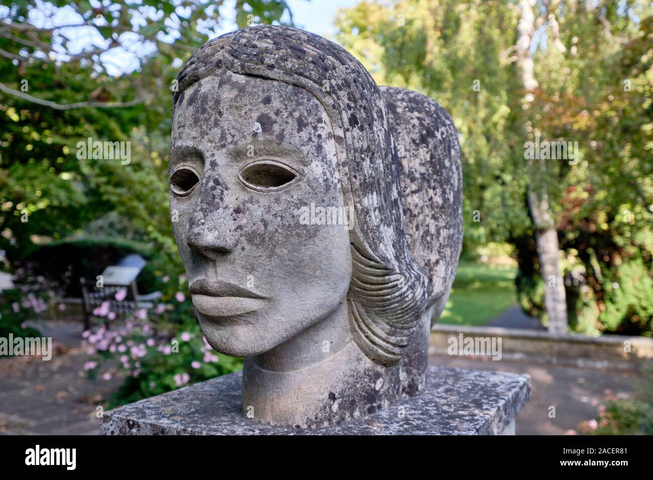 View of female looking head of the Janus head sculpture in the