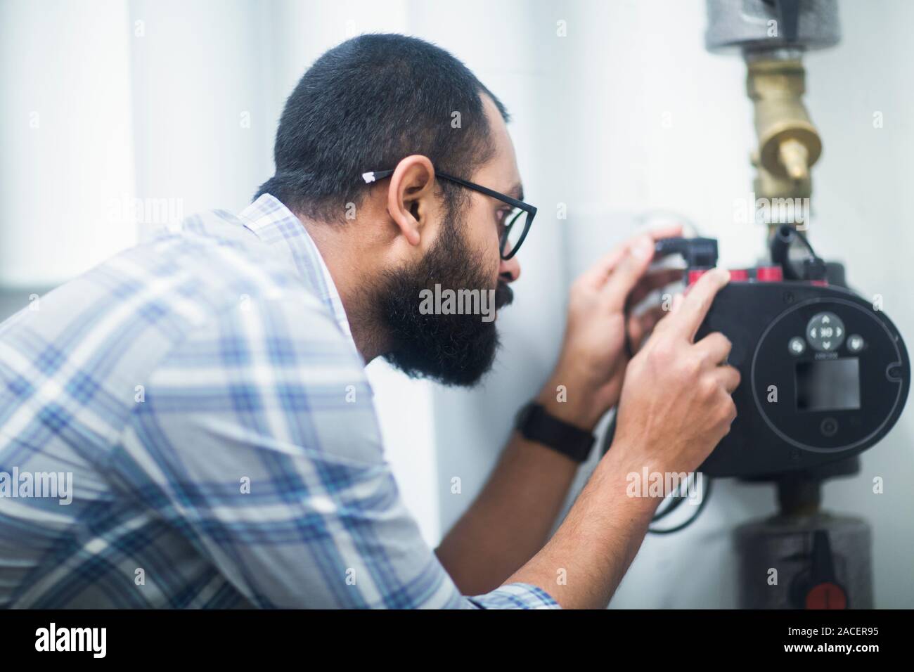 heating engineer checking system Stock Photo
