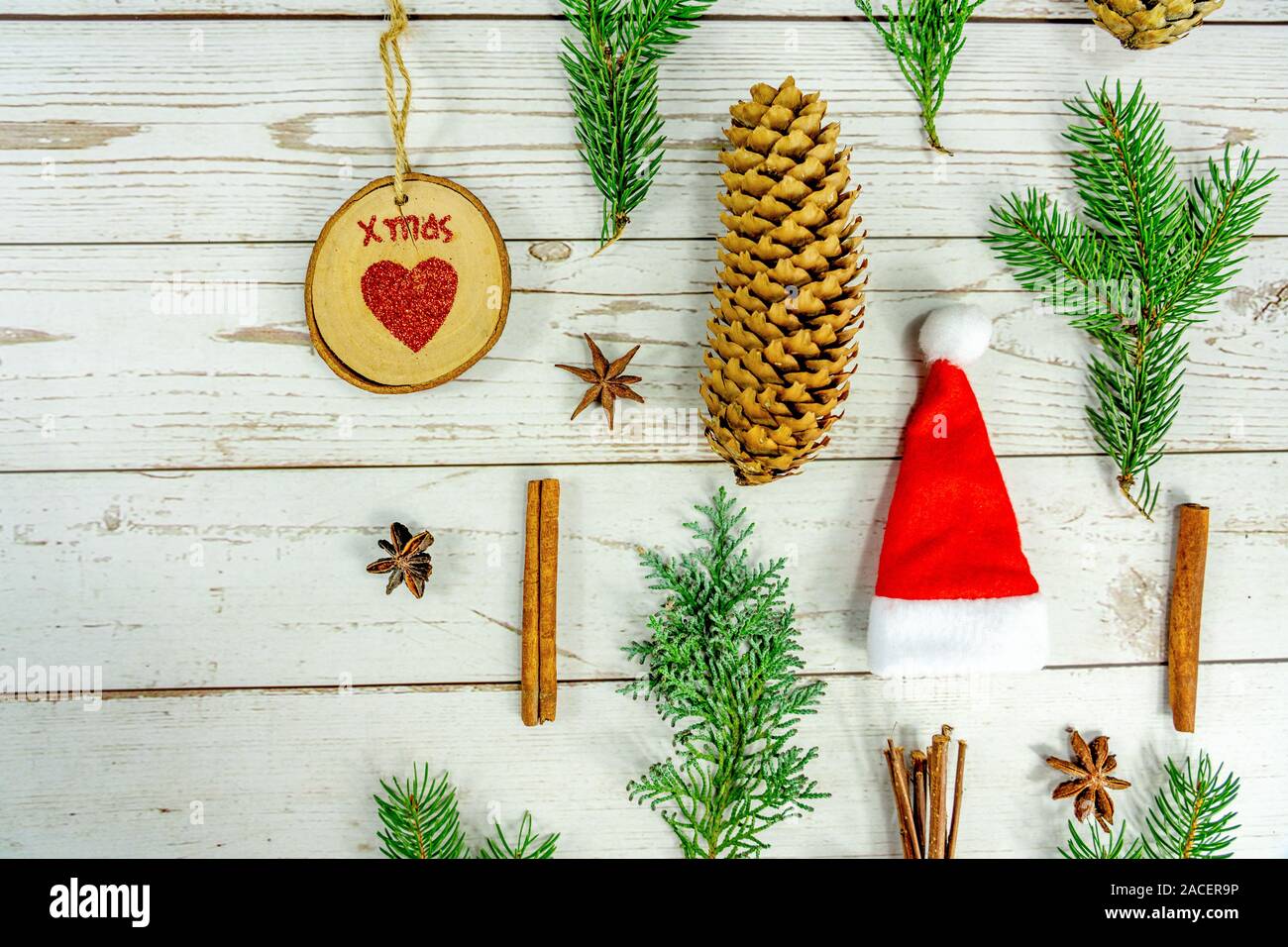 flat lay christmas composition on white wooden background filled frame . Stock Photo