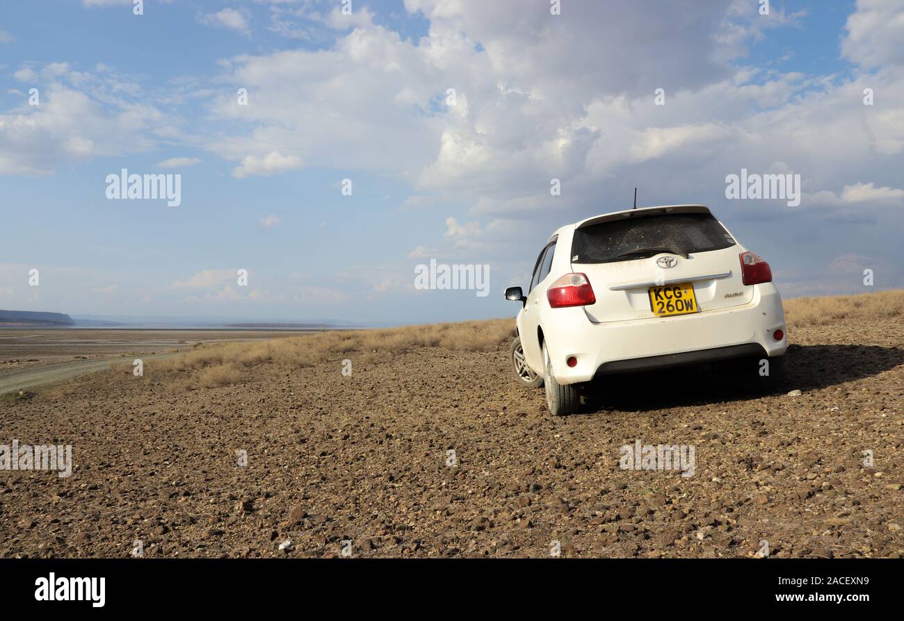 Toyota Auris conquering a rocky hill at Lake Magadi, Kenya Stock Photo