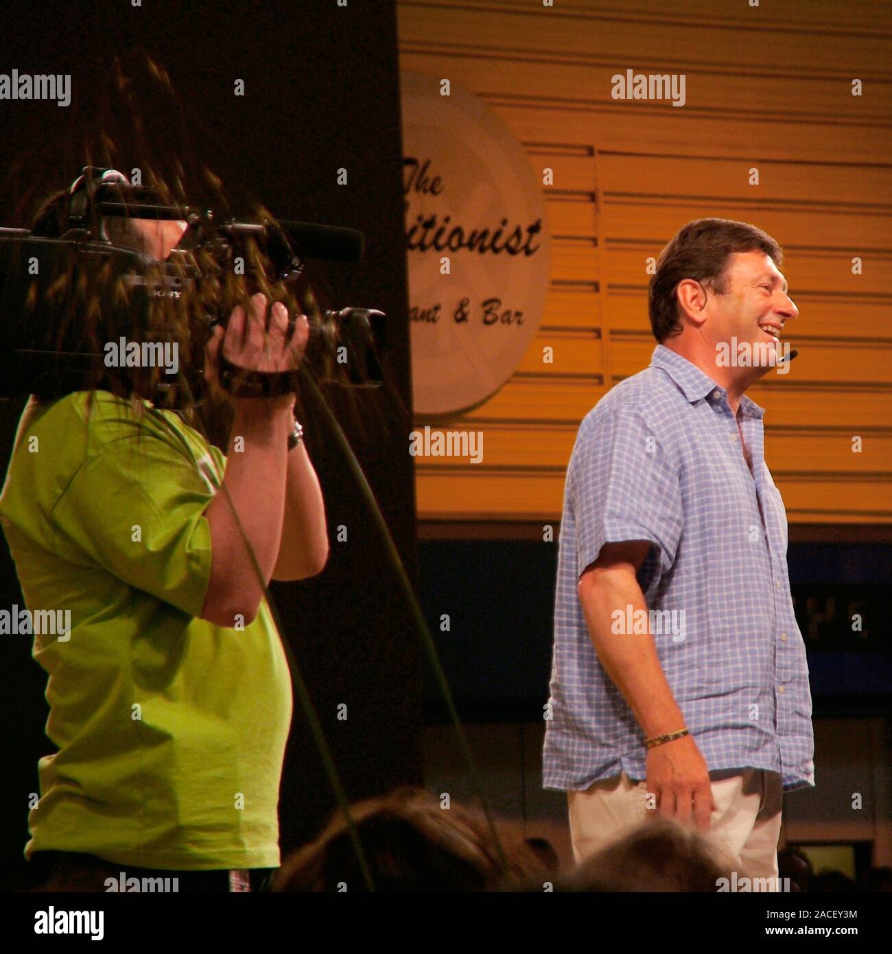 Alan Titchmarsh being filmed. Alan Titchmarsh is a well-known presenter of garden-related television programmes. Stock Photo