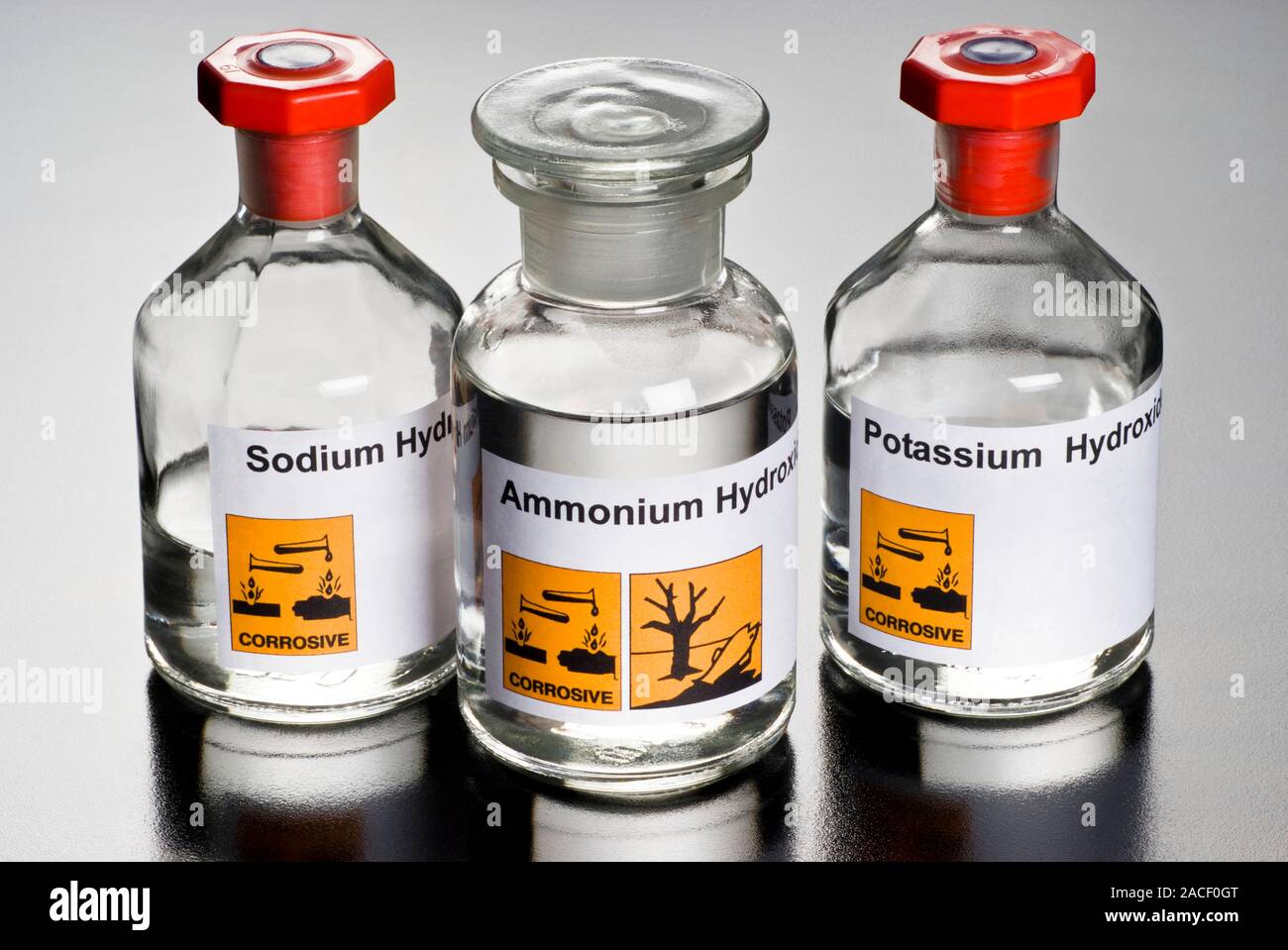 Strong alkalis. From left to right Sodium hydroxide (NaOH), ammonium