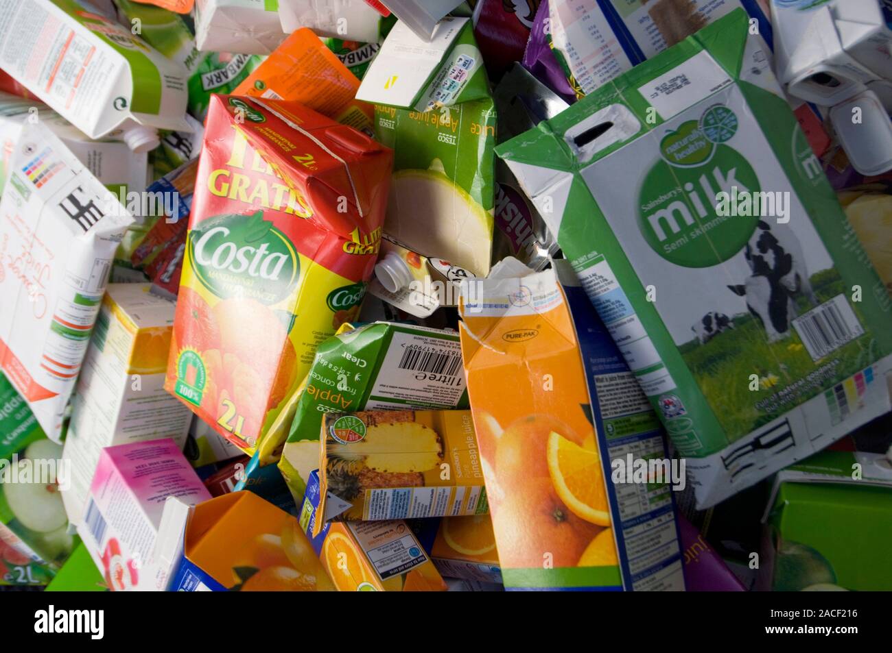 Drink carton recycling. Pile of drinks cartons collected for recycling