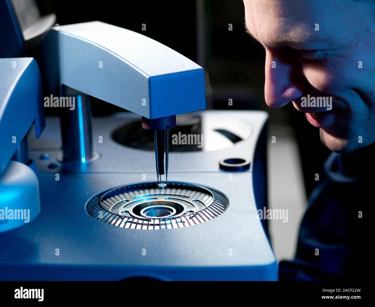Differential scanning calorimetry. Technician testing a sample in a