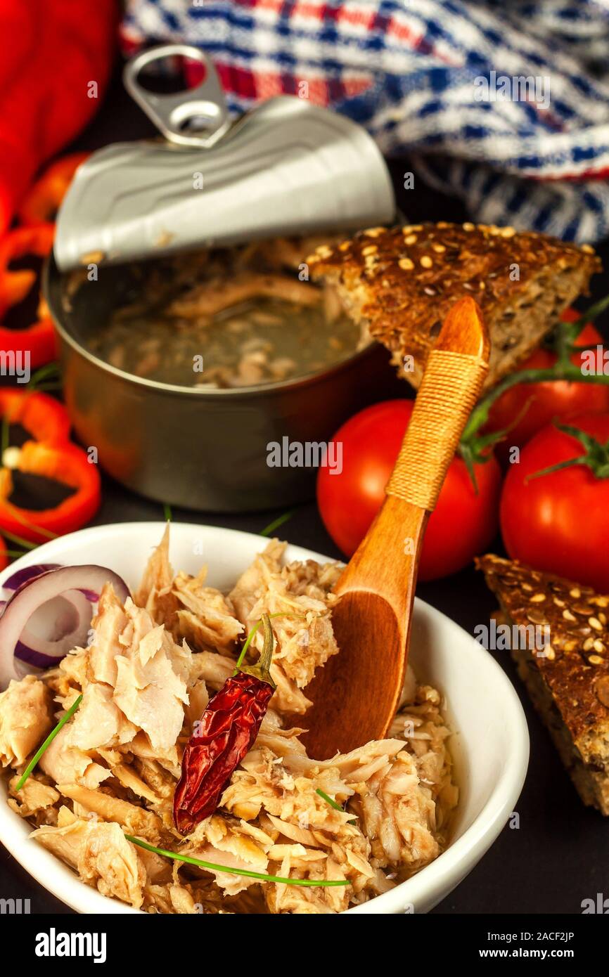 Canned Tuna Fish. Fishing industry. Pieces of Tuna with chilli. Healthy