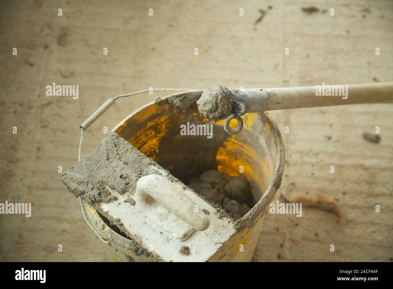 Tools for working with lime plaster. Lime plaster is an ecological alternative without any chemical additives Stock Photo