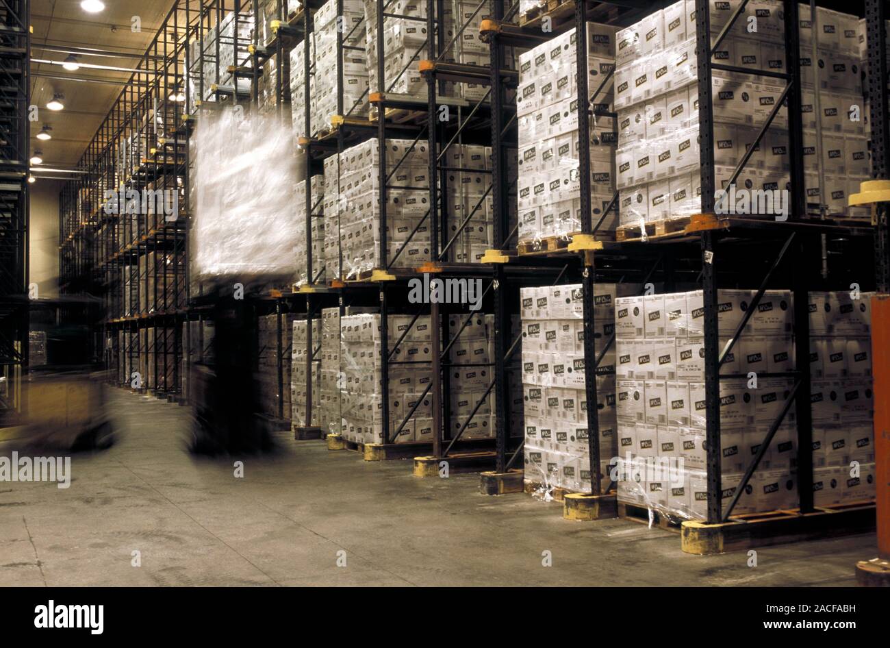 Frozen chip factory. Boxes of frozen chips stacked in a warehouse Stock