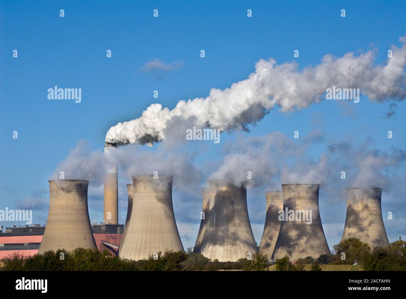 Cooling towers. Water vapour rising out of cooling towers at a power