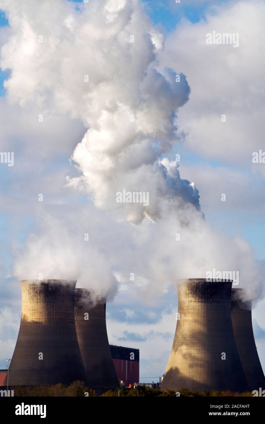 Cooling towers. Water vapour rising out of cooling towers at a power