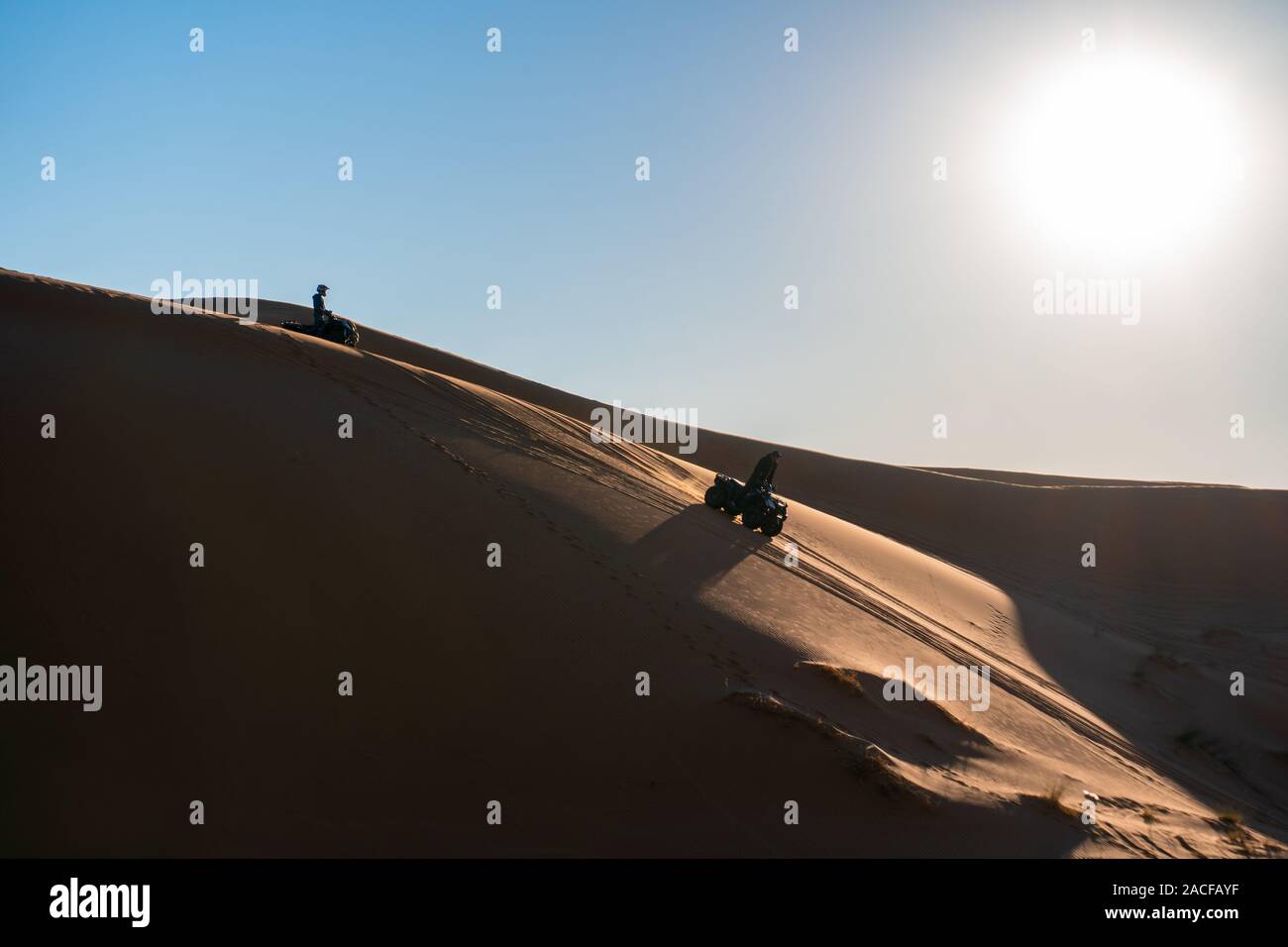 AVT quadrocycle on Sand dunes of Erg Chebbi in the Sahara Desert, Morocco Stock Photo