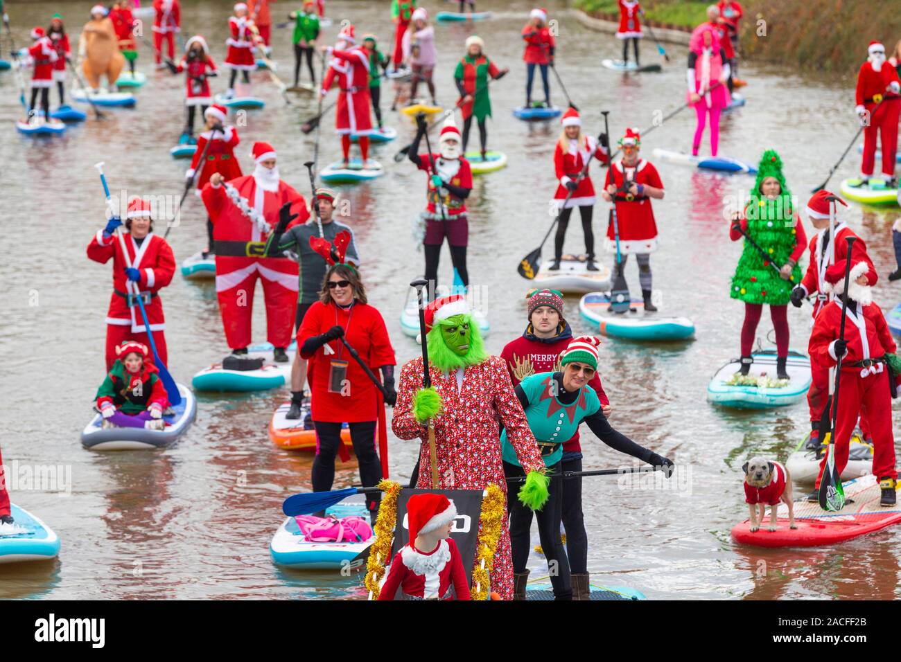 Santa paddle boarders, paddleboarders, tonbridge, charity run, uk Stock Photo