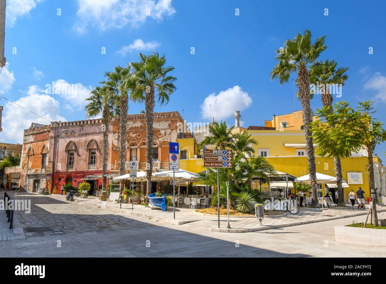 A sidewalk cafe with covered patio at the seaside promenade and boardwalk in the city of Brindisi, Italy, in the Puglia region. Stock Photo