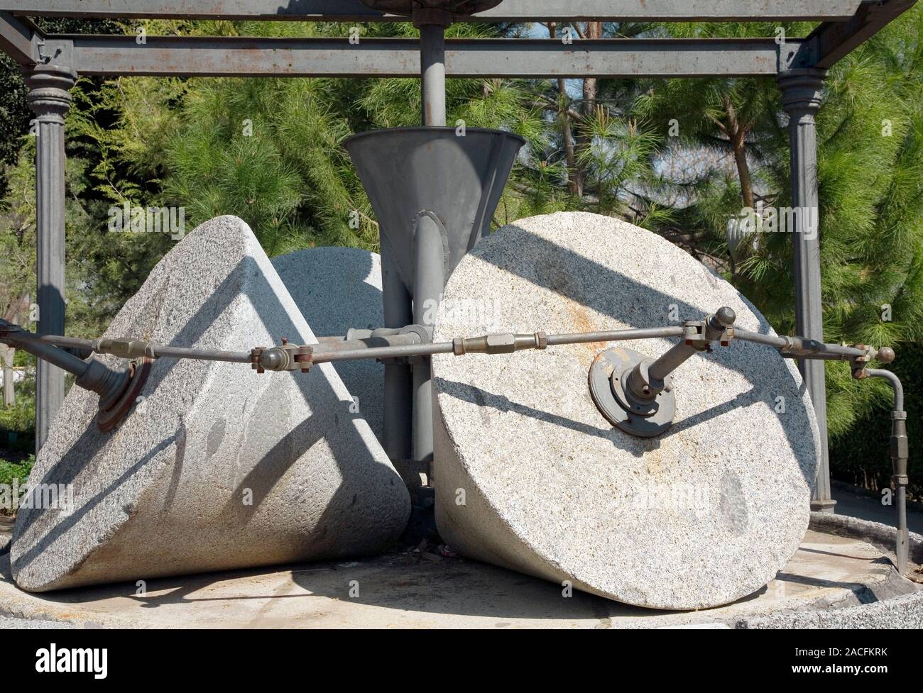 Traditional olive millstones, Spain. These conical millstones consist
