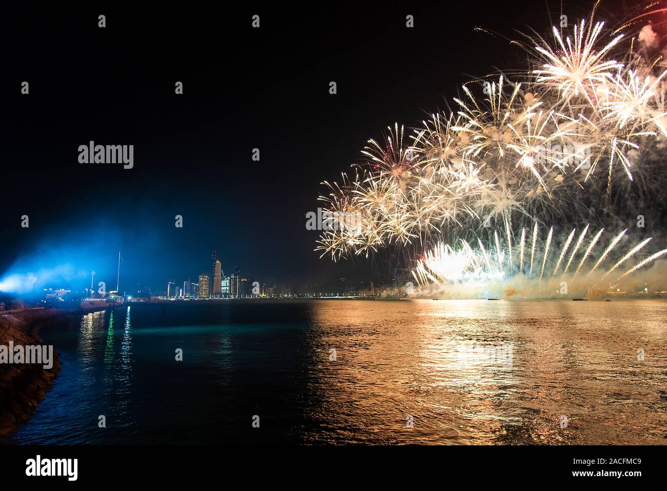 Fireworks over Abu Dhabi cityscape for the United Arab Emirates national day celebration Stock Photo