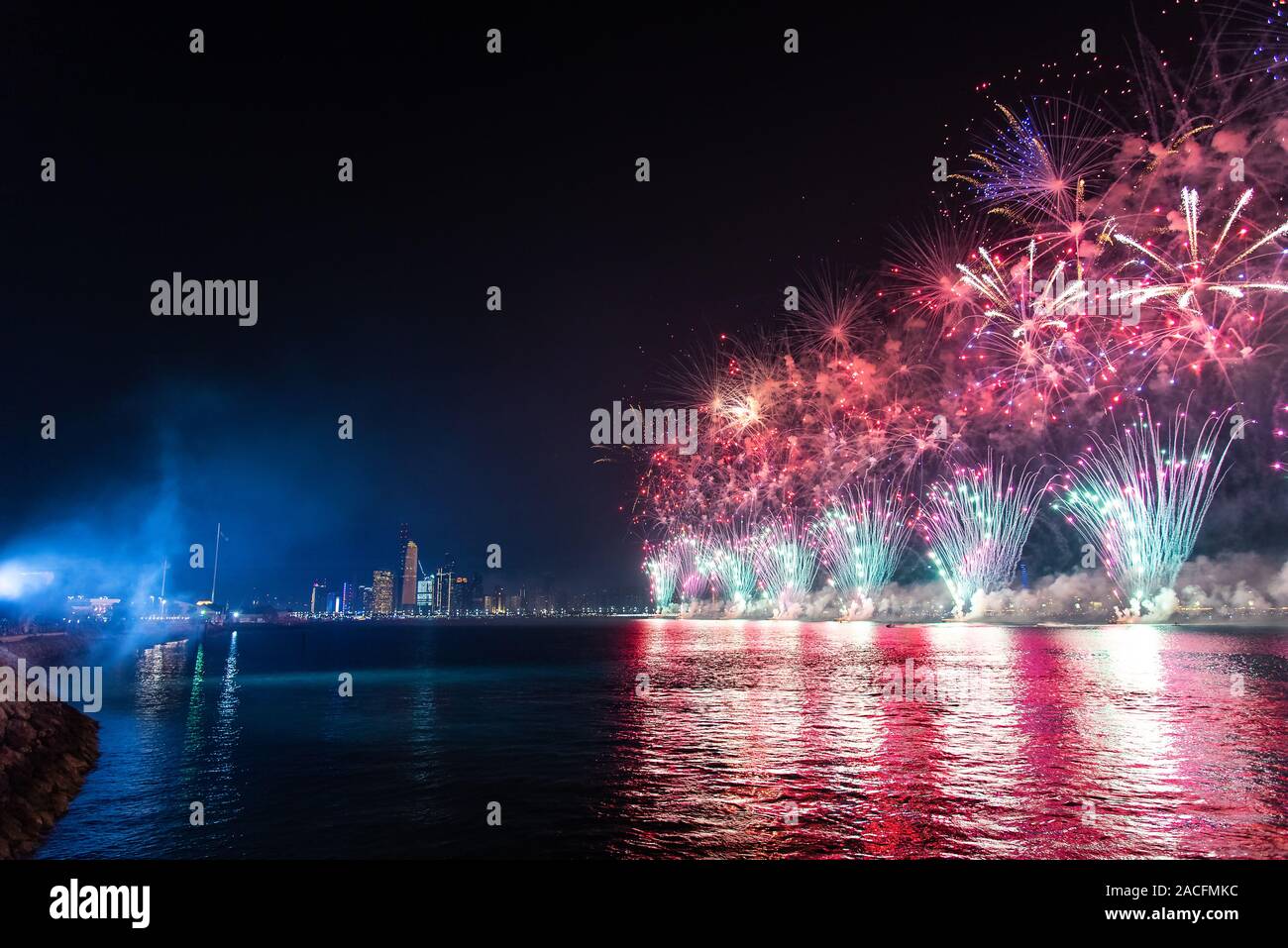 Fireworks over Abu Dhabi cityscape for the United Arab Emirates national day celebration Stock Photo