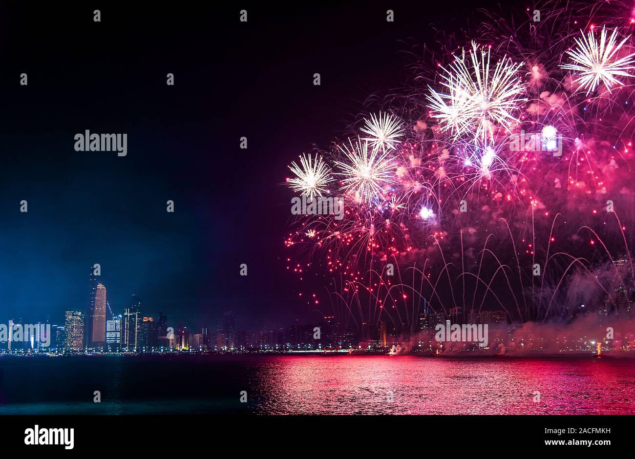 Fireworks over Abu Dhabi cityscape for the United Arab Emirates national day celebration Stock Photo
