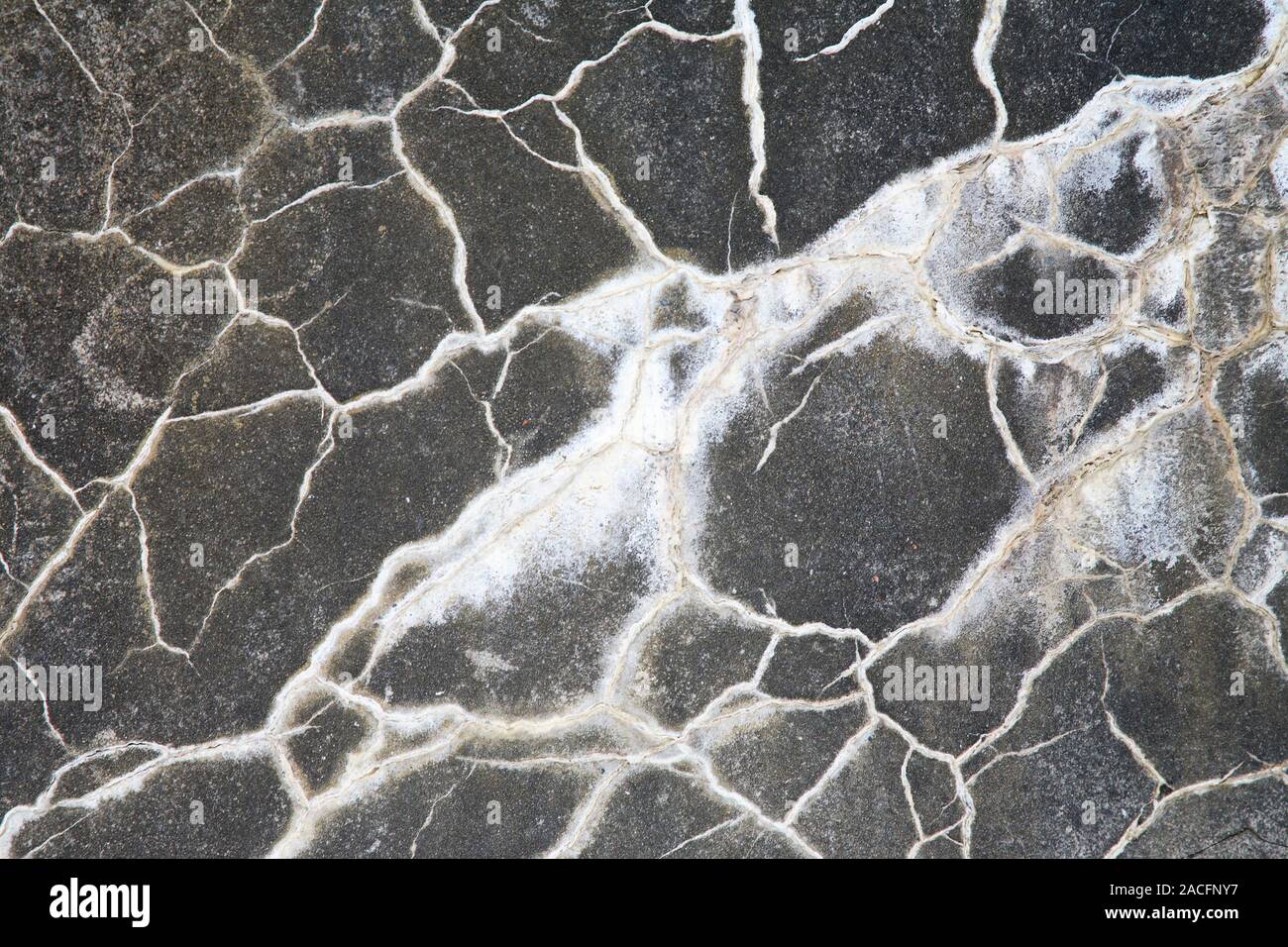 concrete-cracks-white-deposits-formed-by-lime-efflorescence-on-the