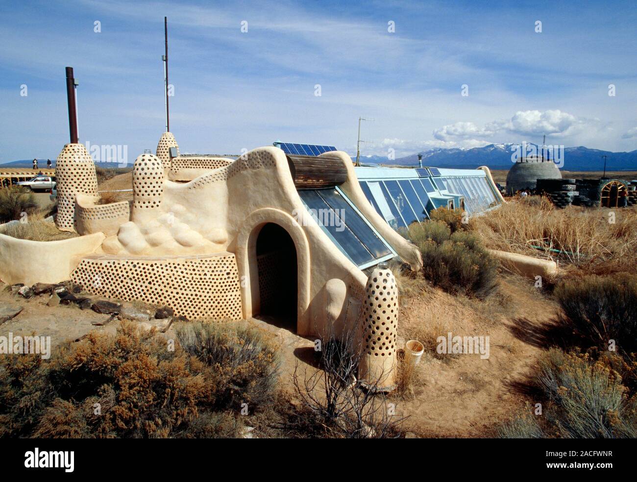 Earthship home, Taos, New Mexico, USA. Earthship buildings are a type