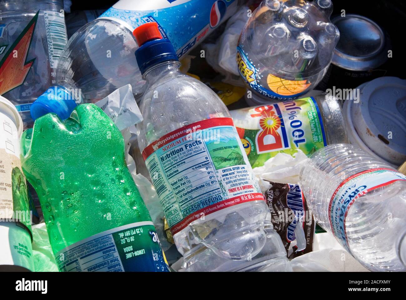 Plastic recycling. Close-up of plastic bottles at a recycling centre ...