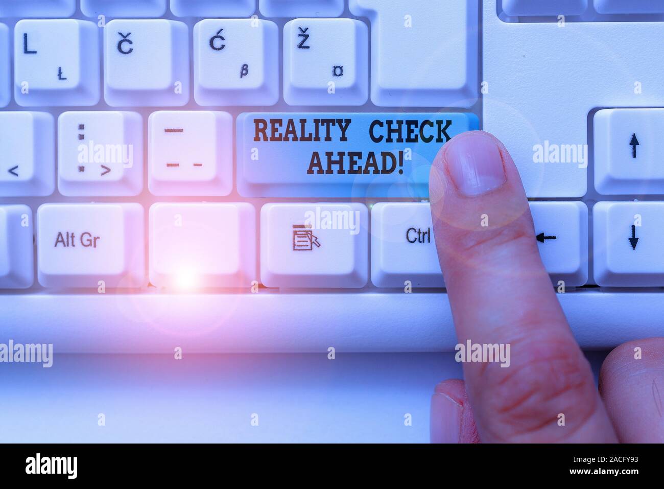 Text sign showing Reality Check Ahead. Business photo text makes them recognize truth about situations or difficulties White pc keyboard with empty no Stock Photo