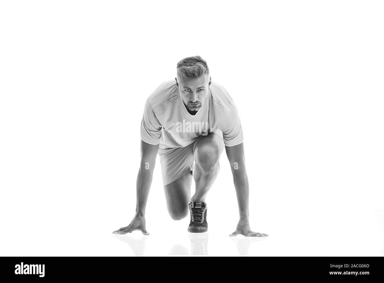 Ready steady go. Man sportsman start running. Runner handsome strong