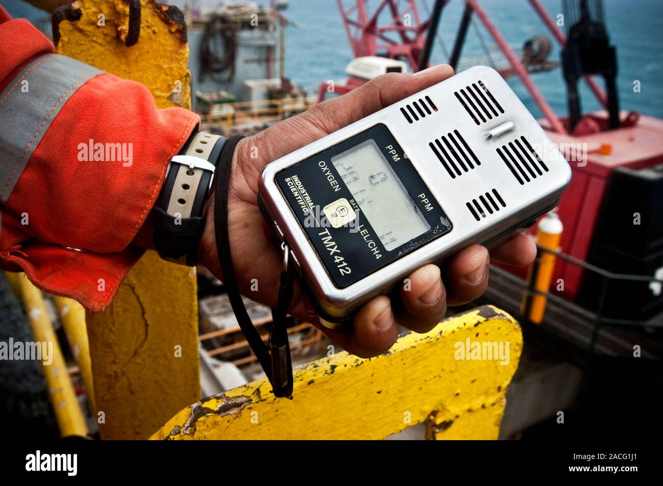 Oil industry safety tests. Safety employee measuring the level of