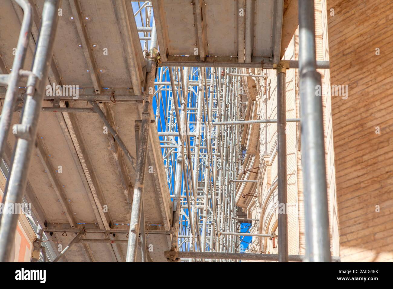 Building construction background with scaffolding Stock Photo - Alamy