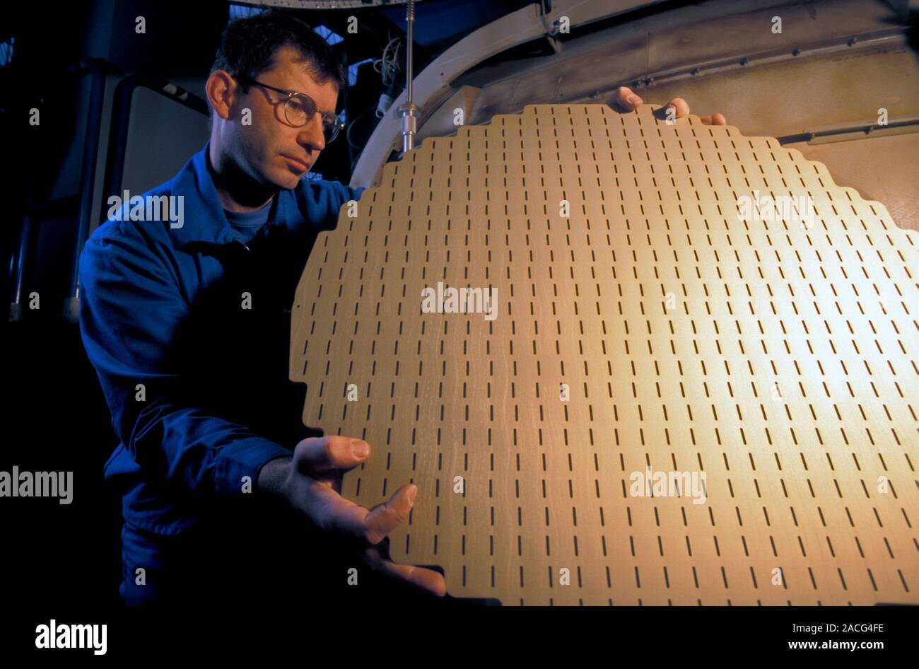 Passenger aircraft construction. Technician installing the weather