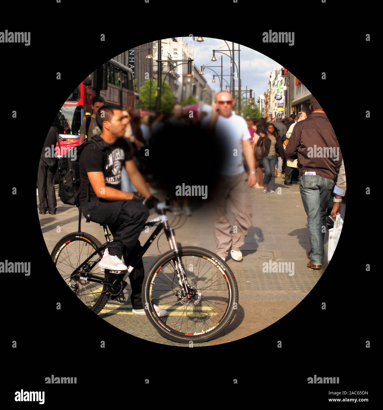 Macular degeneration. Patient'seye view of a busy city street, in a