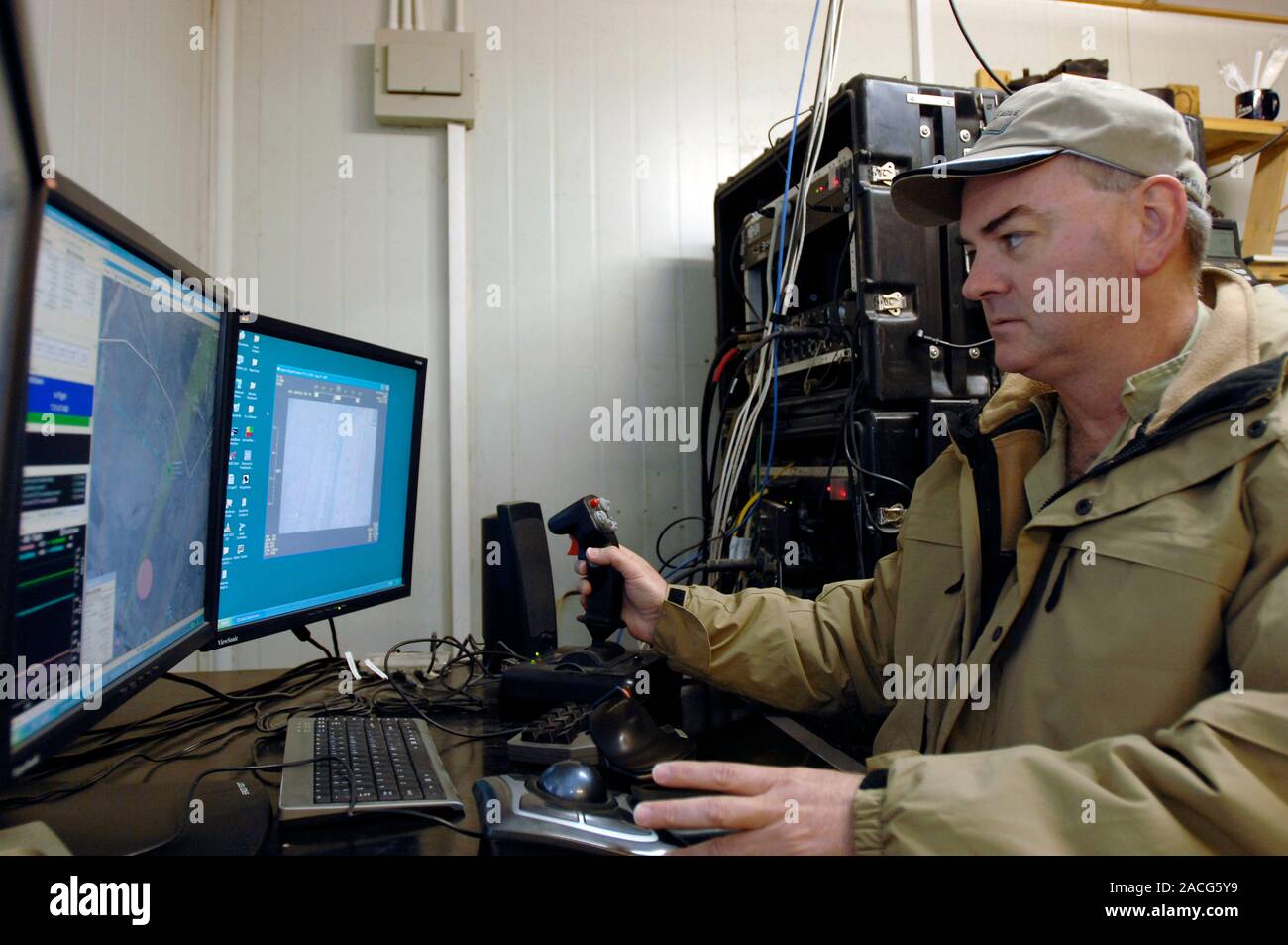 Unmanned aerial vehicle operator, Iraq. The unmanned aerial vehicle ...