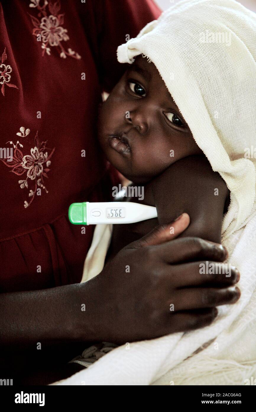 Child healthcare. Bandaged baby boy being held by his mother as his