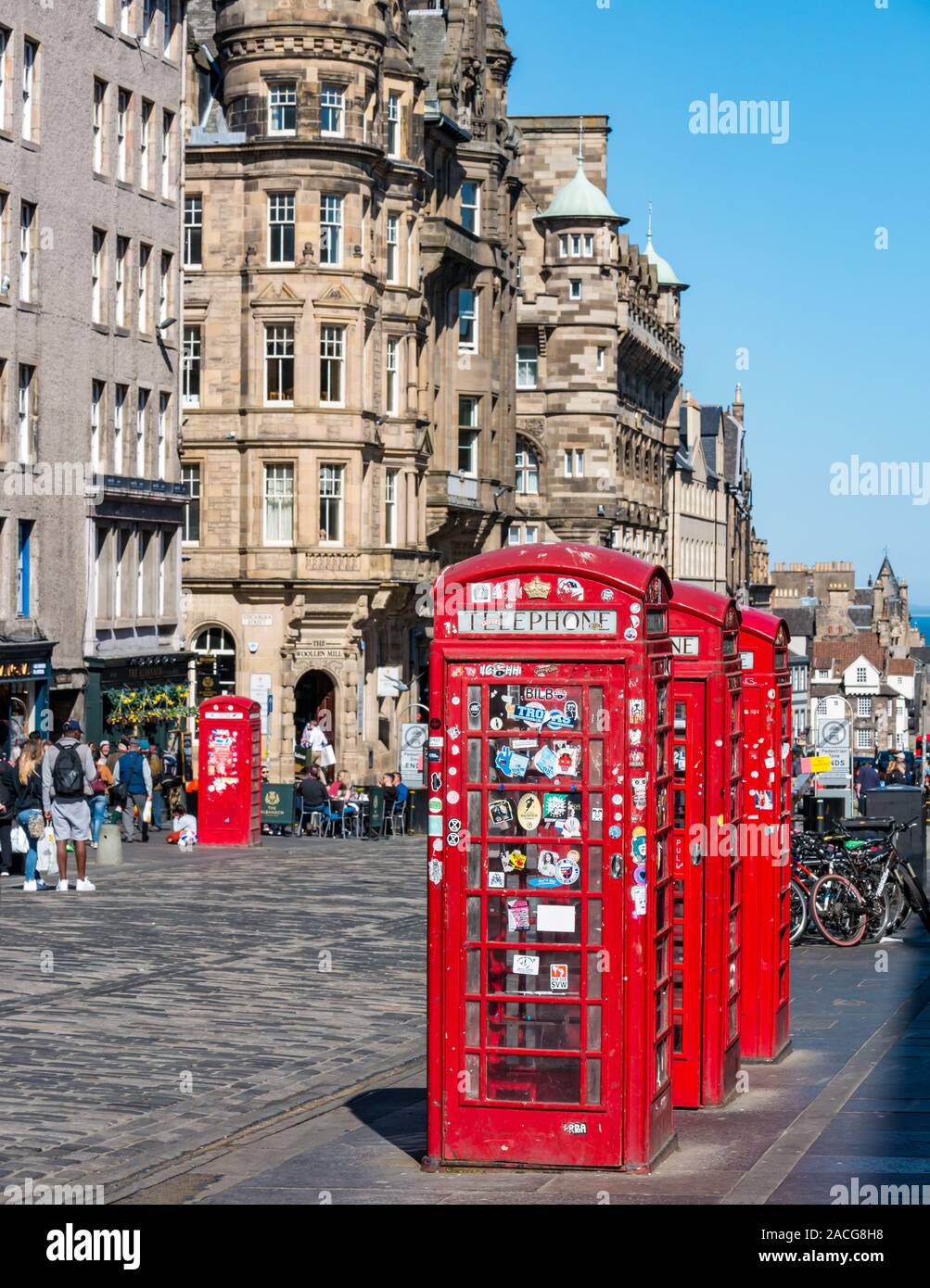 Iconic British red telephone boxes, Royal Mile, Edinburgh, Scotland, UK Stock Photo