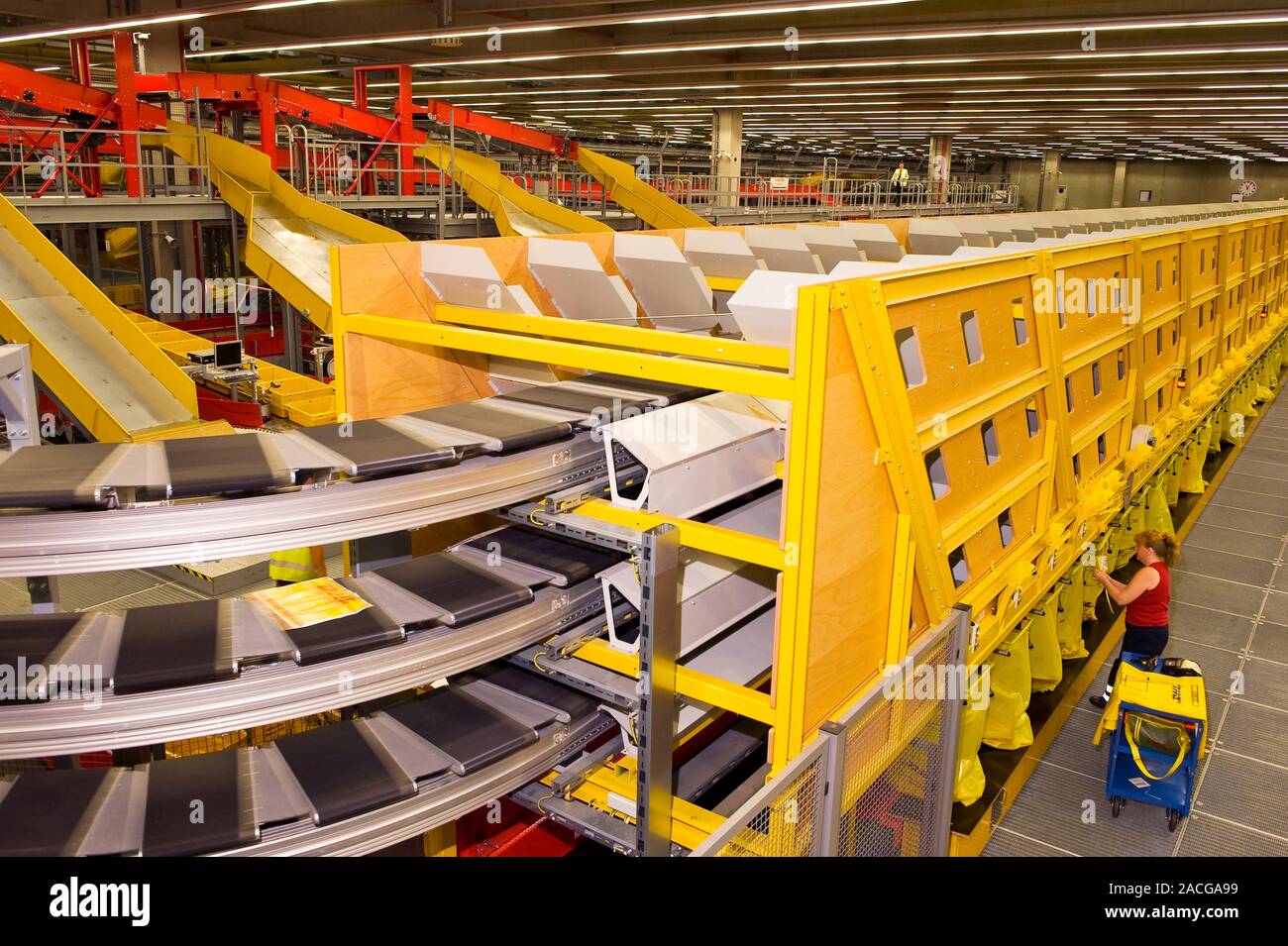 Parcel processing centre. Worker sorting post at the DHL hub in Leipzig, Germany Stock Photo Alamy
