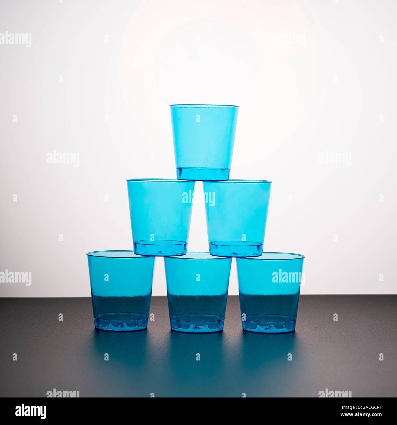 some transparent blue glasses in backlight Stock Photo