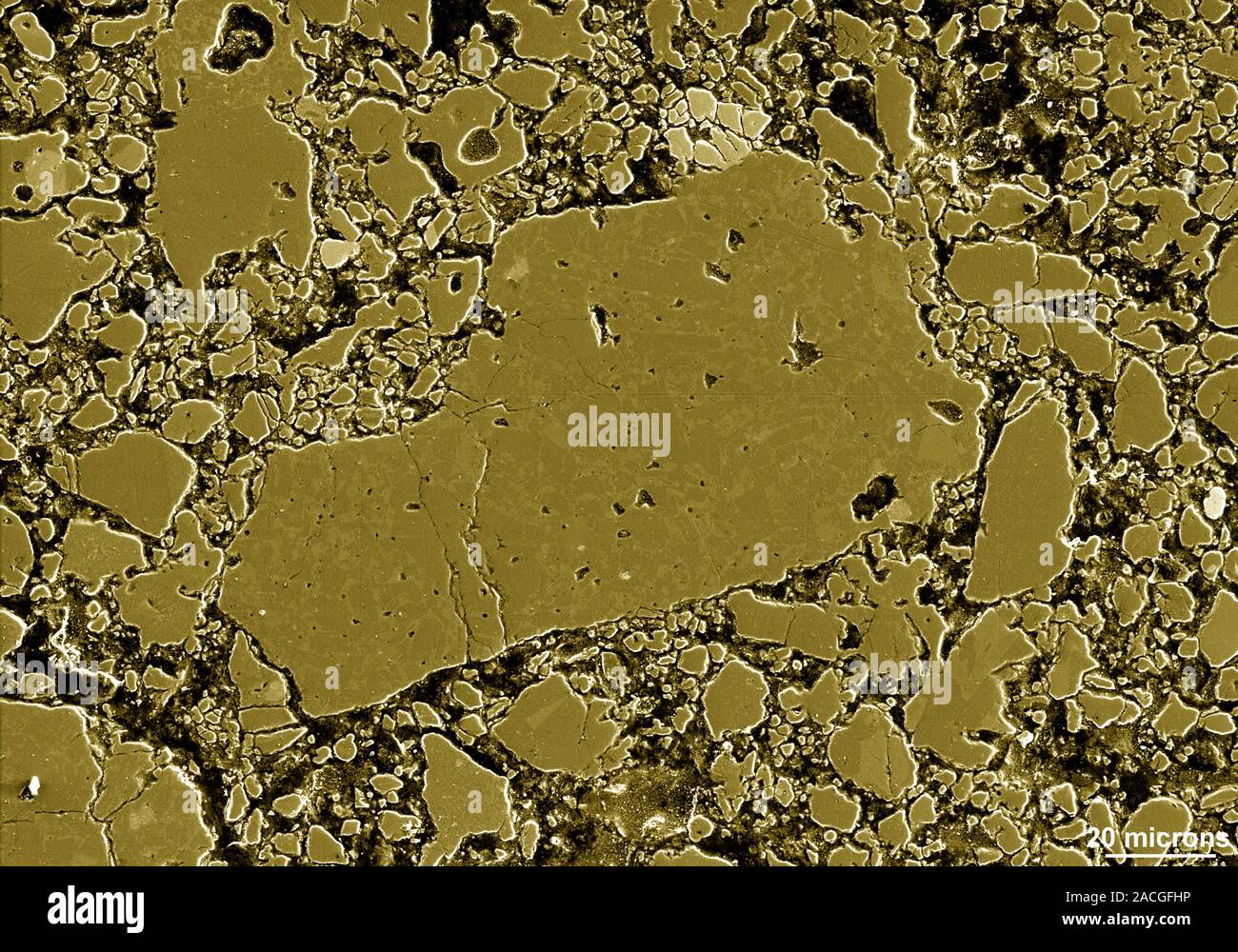 Rock Micrograph Moon rock. Coloured scanning electron micrograph (SEM) of the surface ...