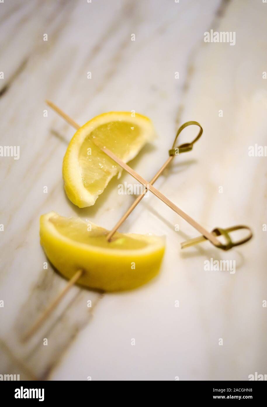 Two drink lemon garnishes Stock Photo
