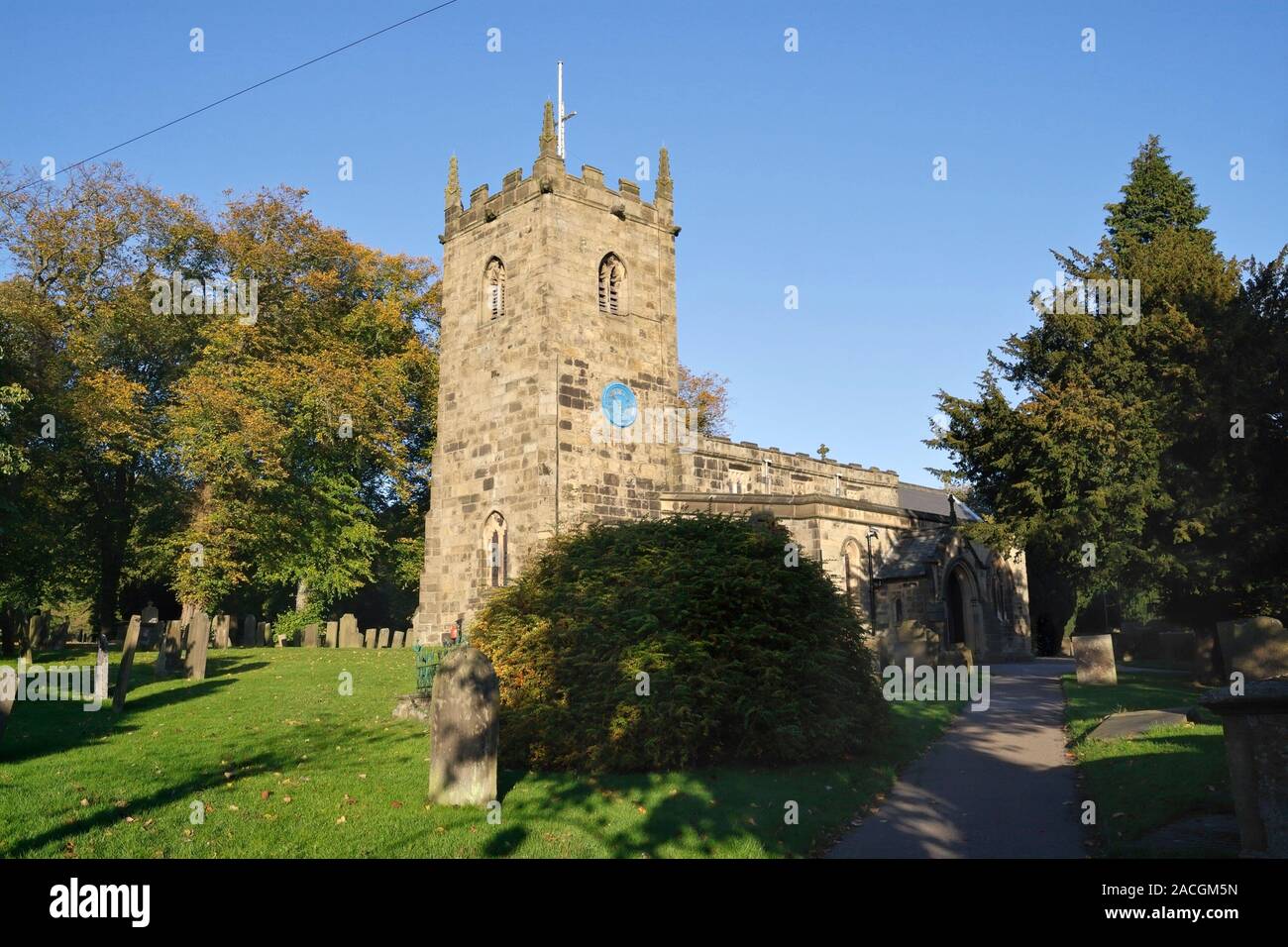 The Parish Church of St Lawrence in Eyam in Derbyshire England UK, English rural village church grade II* listed building Stock Photo